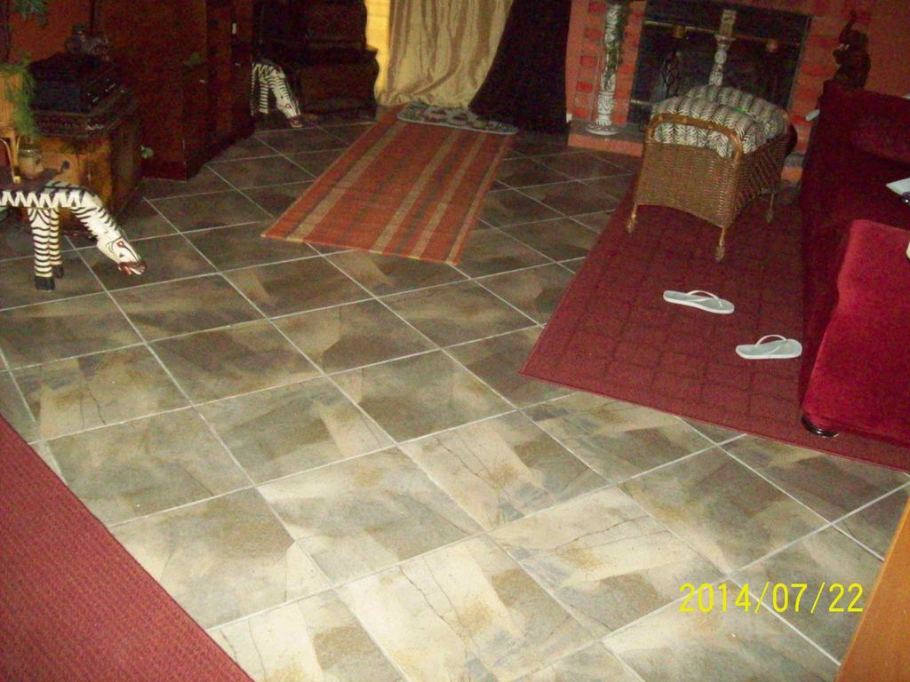 Tile work after removing baseboards and carpet.