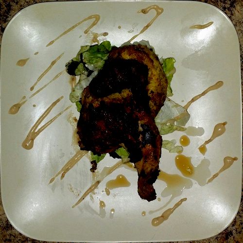 Cilantro marinated cornish game hen with roasted g