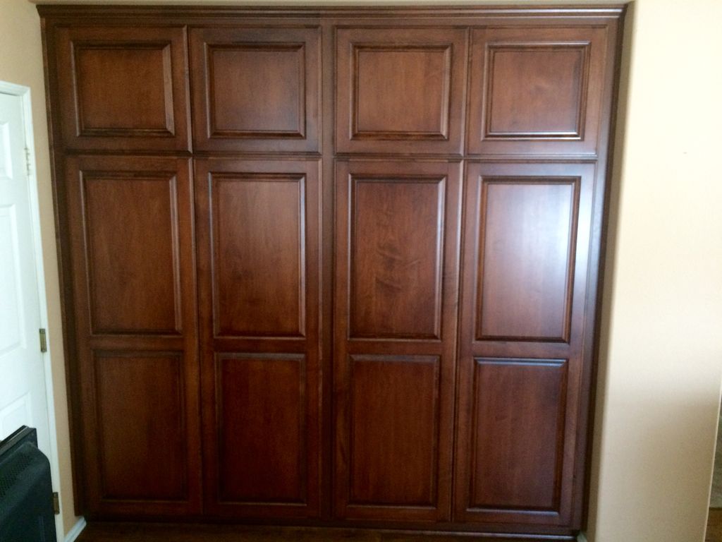 Wall of cabinets installed in kitchen