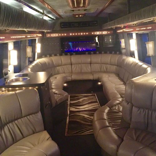 This party bus offers comfort and style!  Great ai