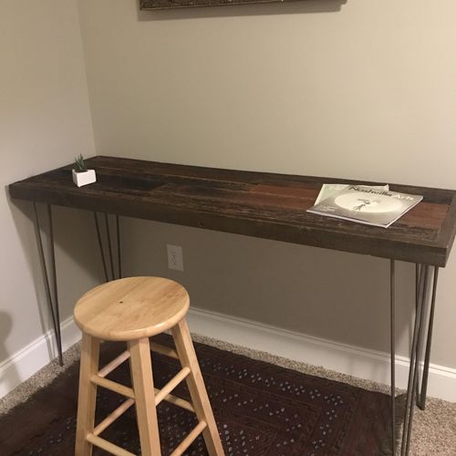 A custom built minimalist desk made with reclaimed