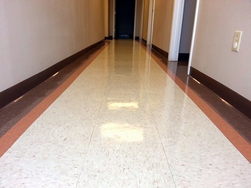 Commercial floor. Strip and wax.
