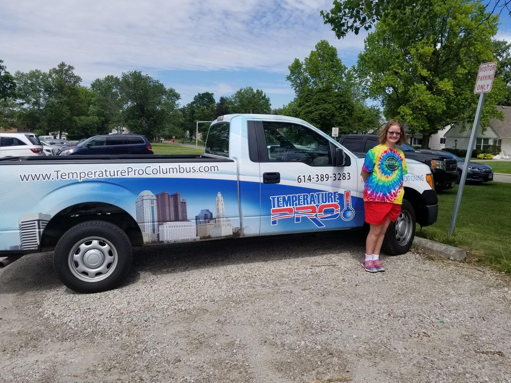 Grace showing off the truck
