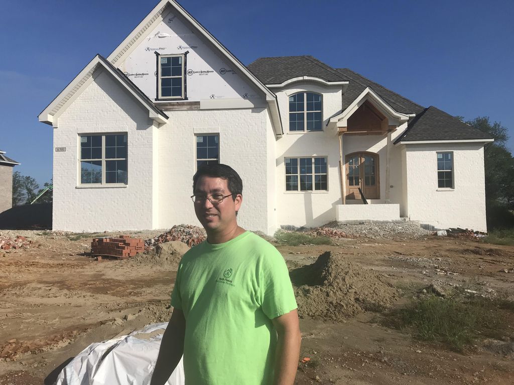 Assisting a painter on new construction