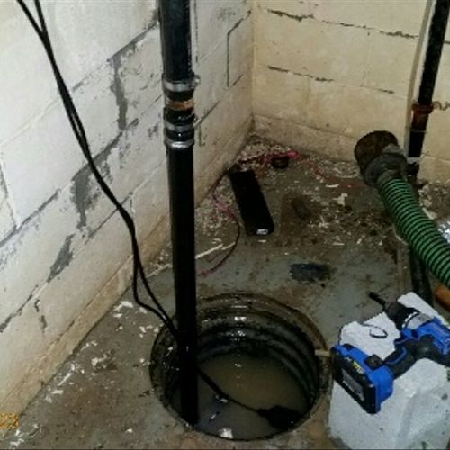 Water removed, new sump pump installed
