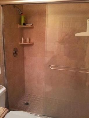 Remodeled shower with new glass doors