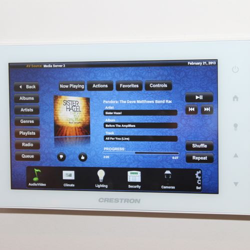 Crestron touchpanel on music selection page.