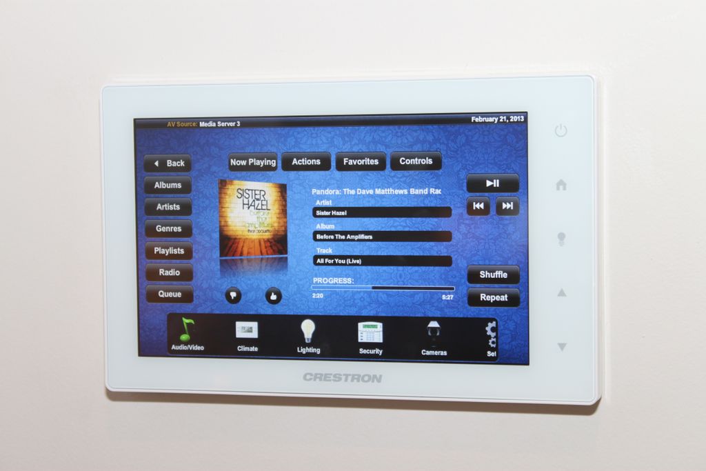 Crestron touchpanel on music selection page.