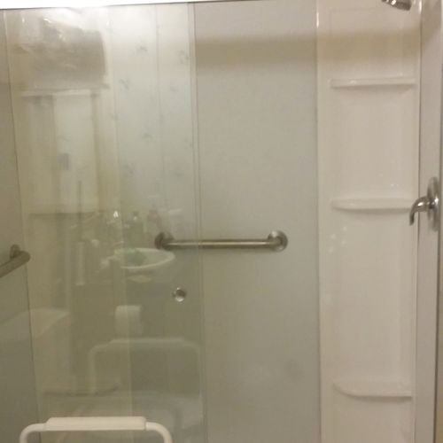 shower install with tub surround toilet and handic