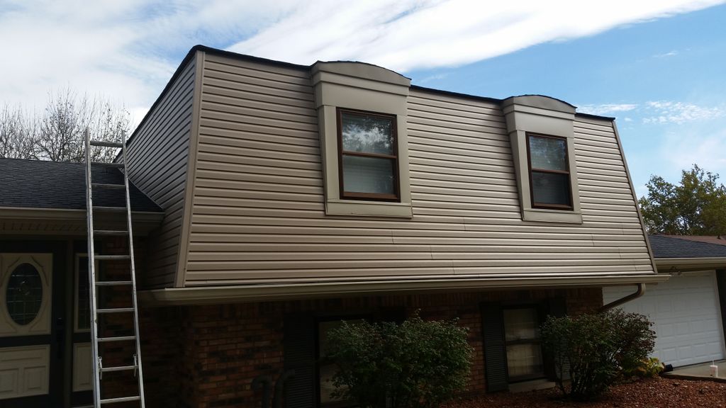 Roofing torn off, and replaced with siding, and ne