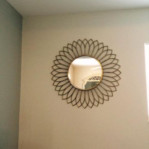 A mirror I mounted on the wall.