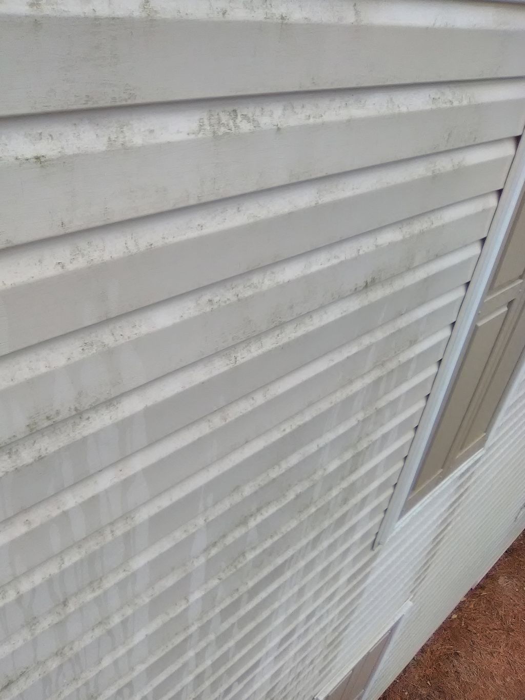 Siding before pressure washing