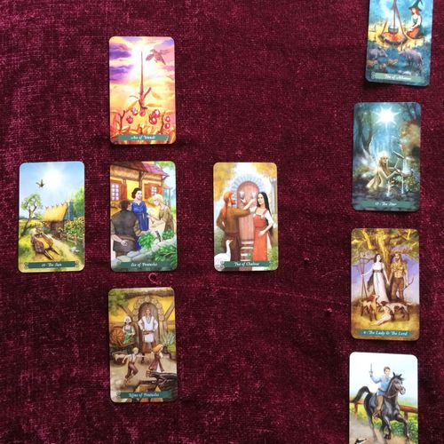 Sample tarot reading spread out on my reading clot