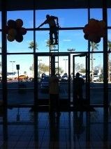 Large auto dealership window cleaning.