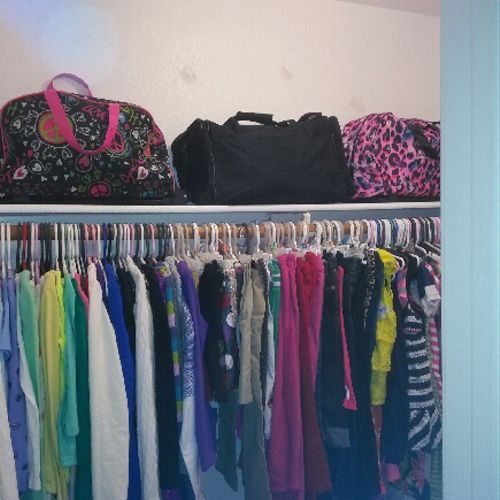 After picture of clothes hung by season and top sh