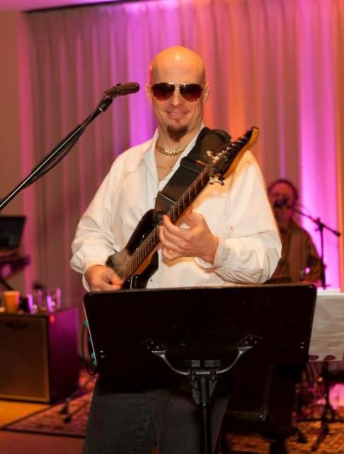 A disco themed party with the wedding band I play 