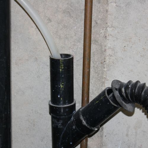 improper drain hookup allowing sewer gases in to t
