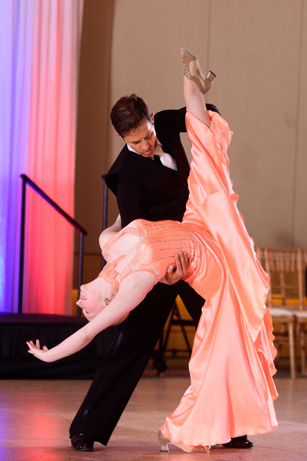 Student performing wit instructor