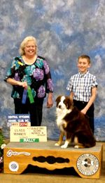 Sam Beach and his dog Scout CGC winning the Novice