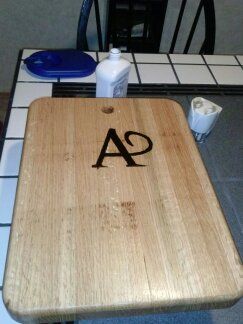 This is a custom made cutting board, oak, and wood
