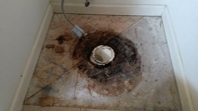 rotted subfloor, flange was rusted away and toilet