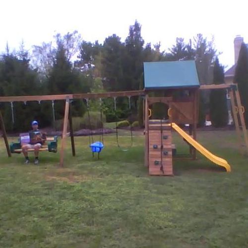 A friend and I constructed this playhouse/swingset
