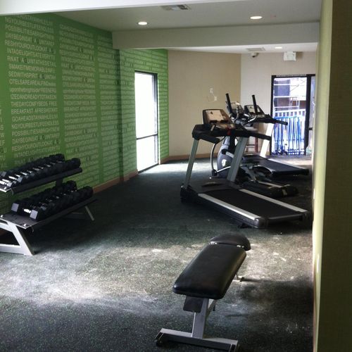 Hotel renovation. Gym equipment assembly and place