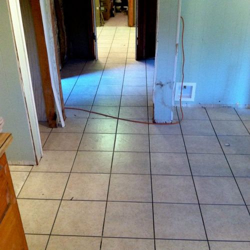 Tile flooring being installed