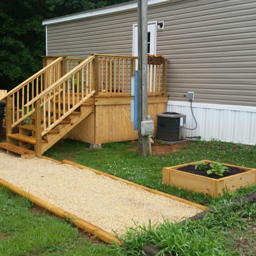 Deck project with walkway and raised planter