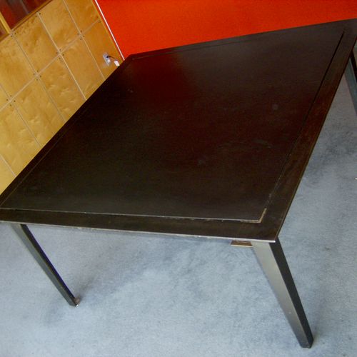 Blackened steel conference table