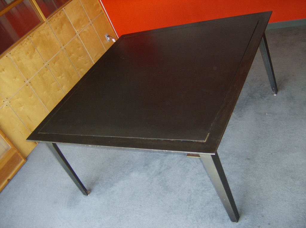 Blackened steel conference table
