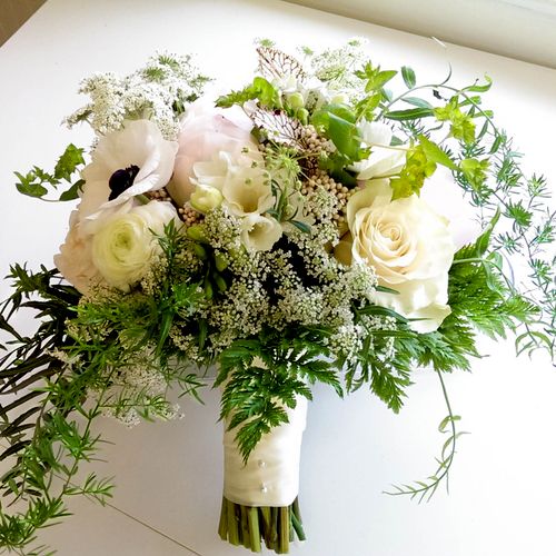 Organic and green inspired bouquet featuring seaso