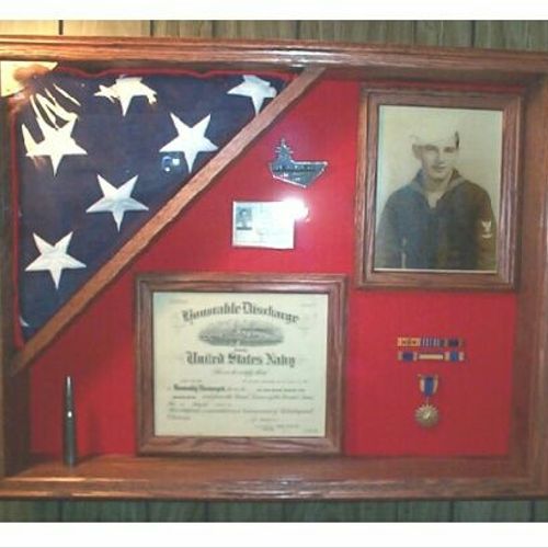 Large shadow box with folded flag.