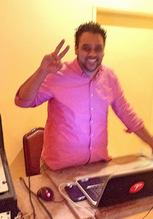 Enjoying being the DJ for this engagement party.