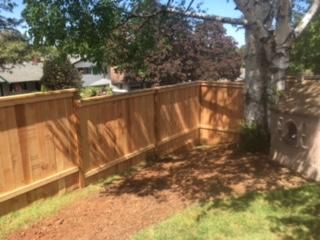 South Salem, Oregon.  Custom cedar stepped fence w