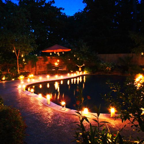 Residential pool area candle lighting.