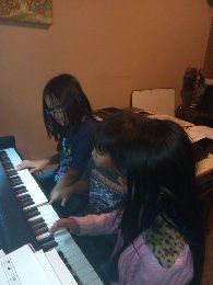 brothers and sister take lessons