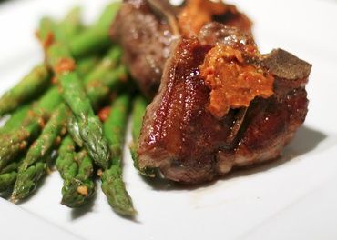 LAMB CHOPS WITH SUN DRIED TOMATOES BUTTER/ASPARAGU