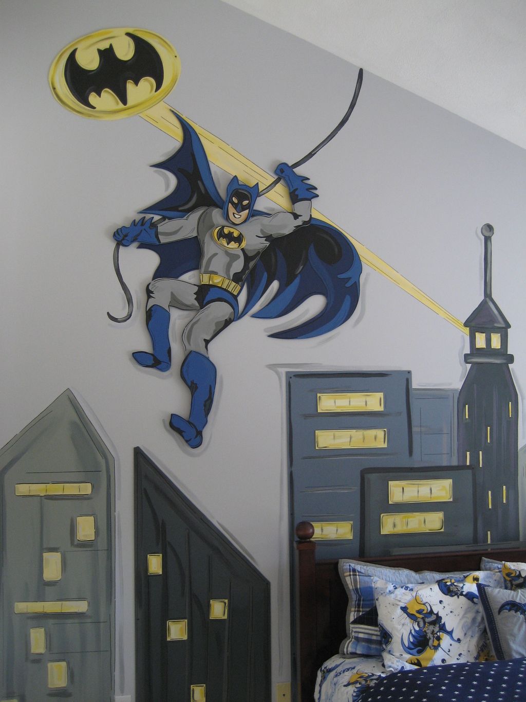 This mural is done with wood cutouts and paint cre