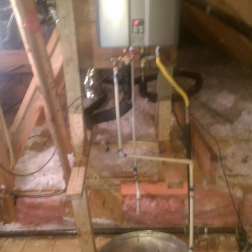 installed tankless renni water heater in attic