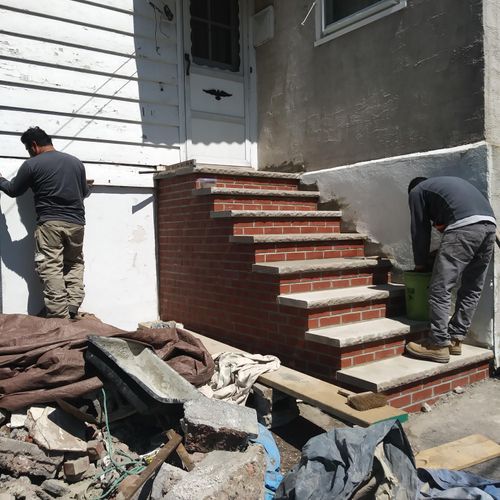 Rebuilding the steps and stucco work as well as si