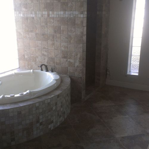 different sizes of tile( floor, walls and tub). wa