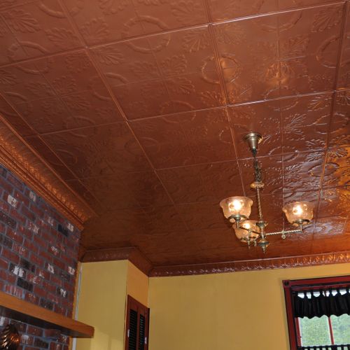 Tin ceiling with matching tin crown.