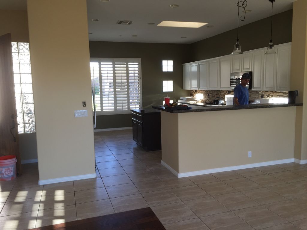 We painted the walls, ceilings, trim, and the cabi