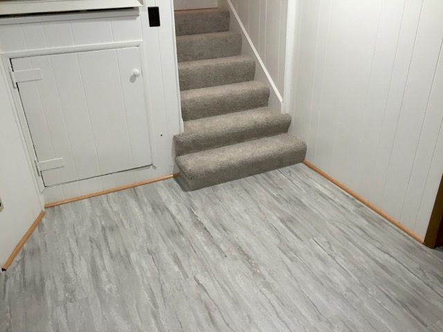 Luxury vinyl and stair carpeting in Burnsville