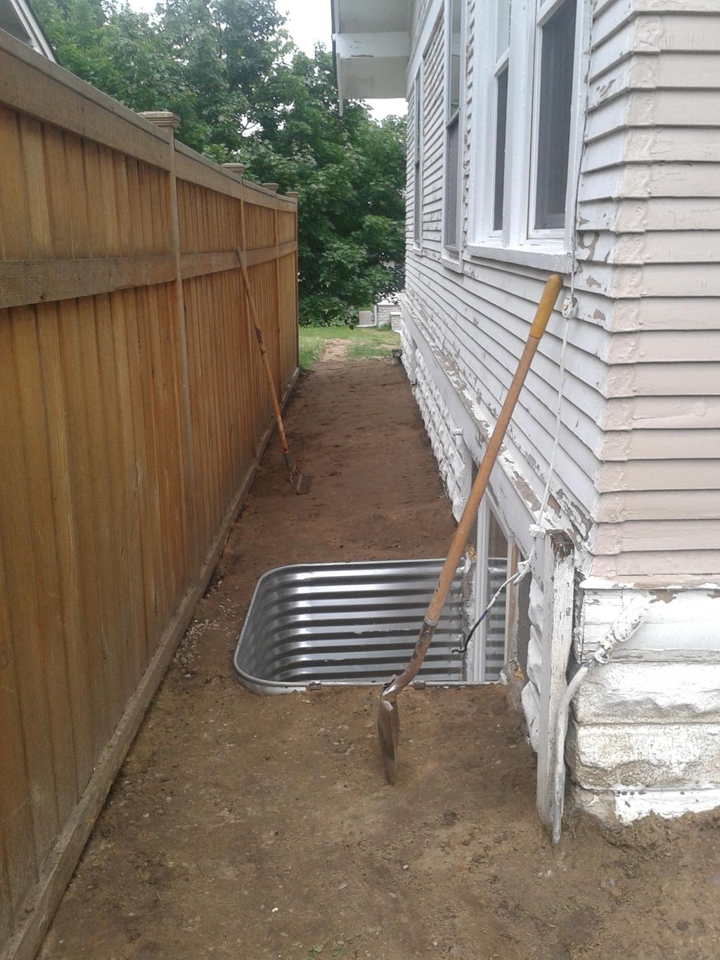 Regrading and recess well