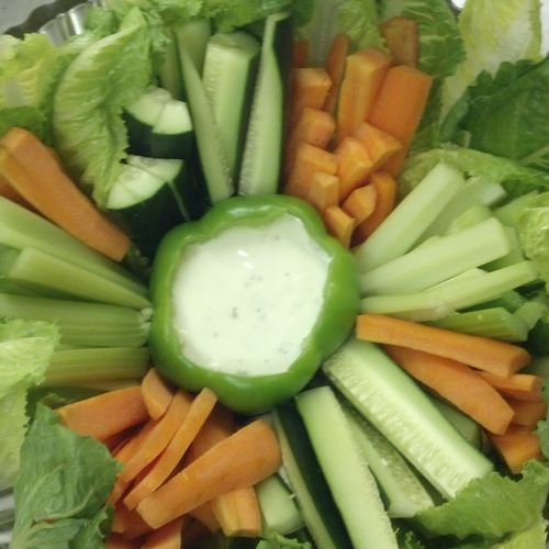 Vegetable tray garnished with romaine.