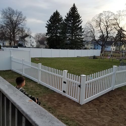 Installing a solid vinyl and a picket vinyl fence