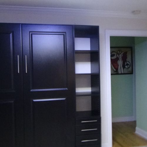 Murphy bed assembled and mounted to wall