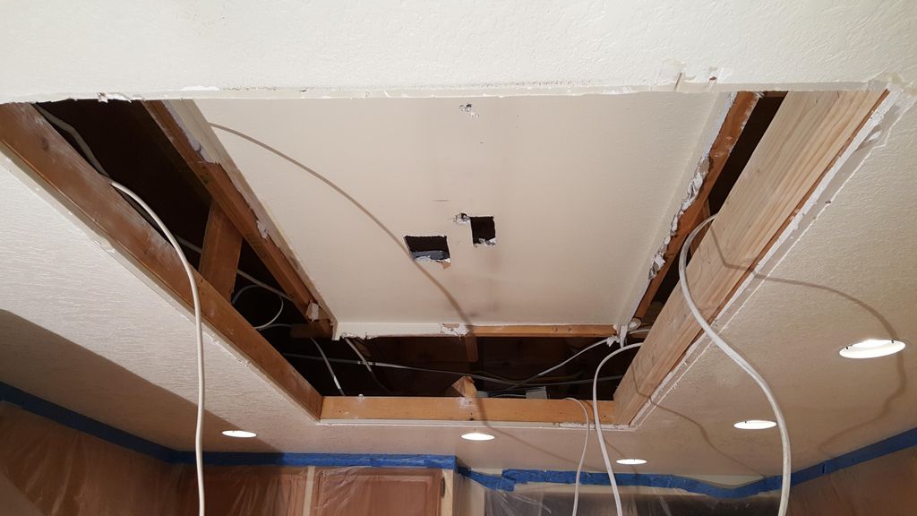 Tore out sides of old recessed light box in kitche